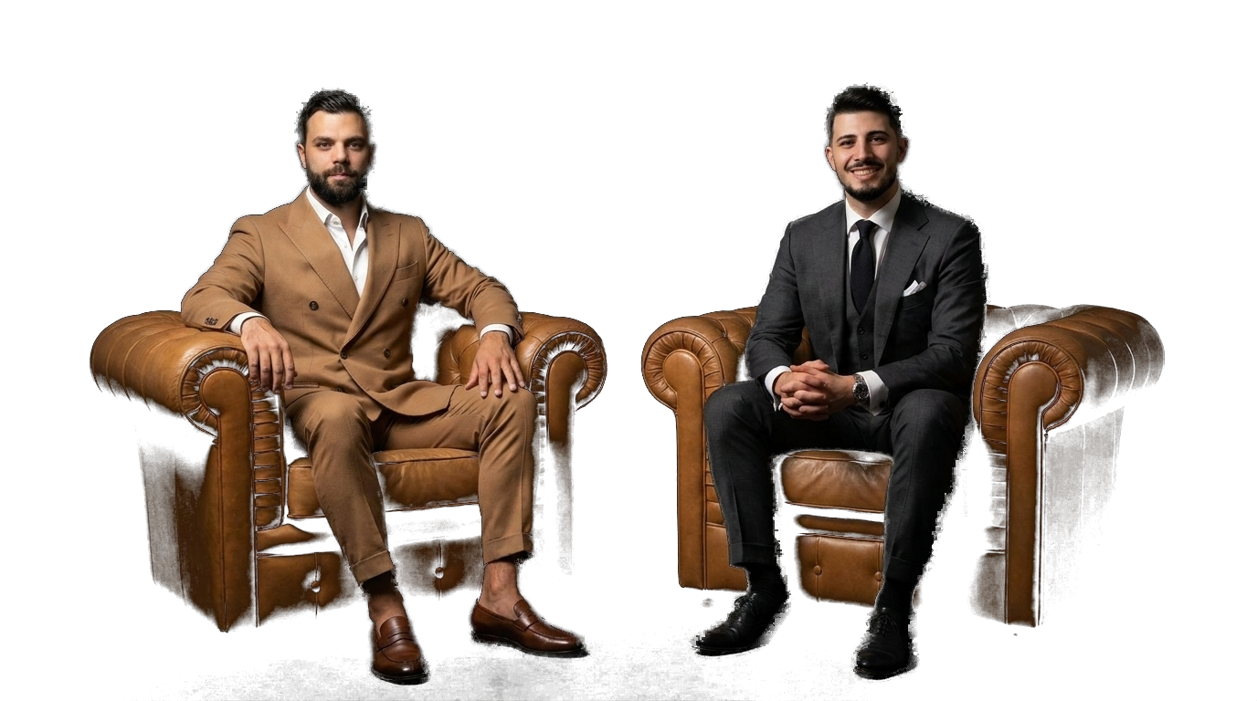 Mario Costa and Hannes Danho seated on tan leather chairs, facing camera